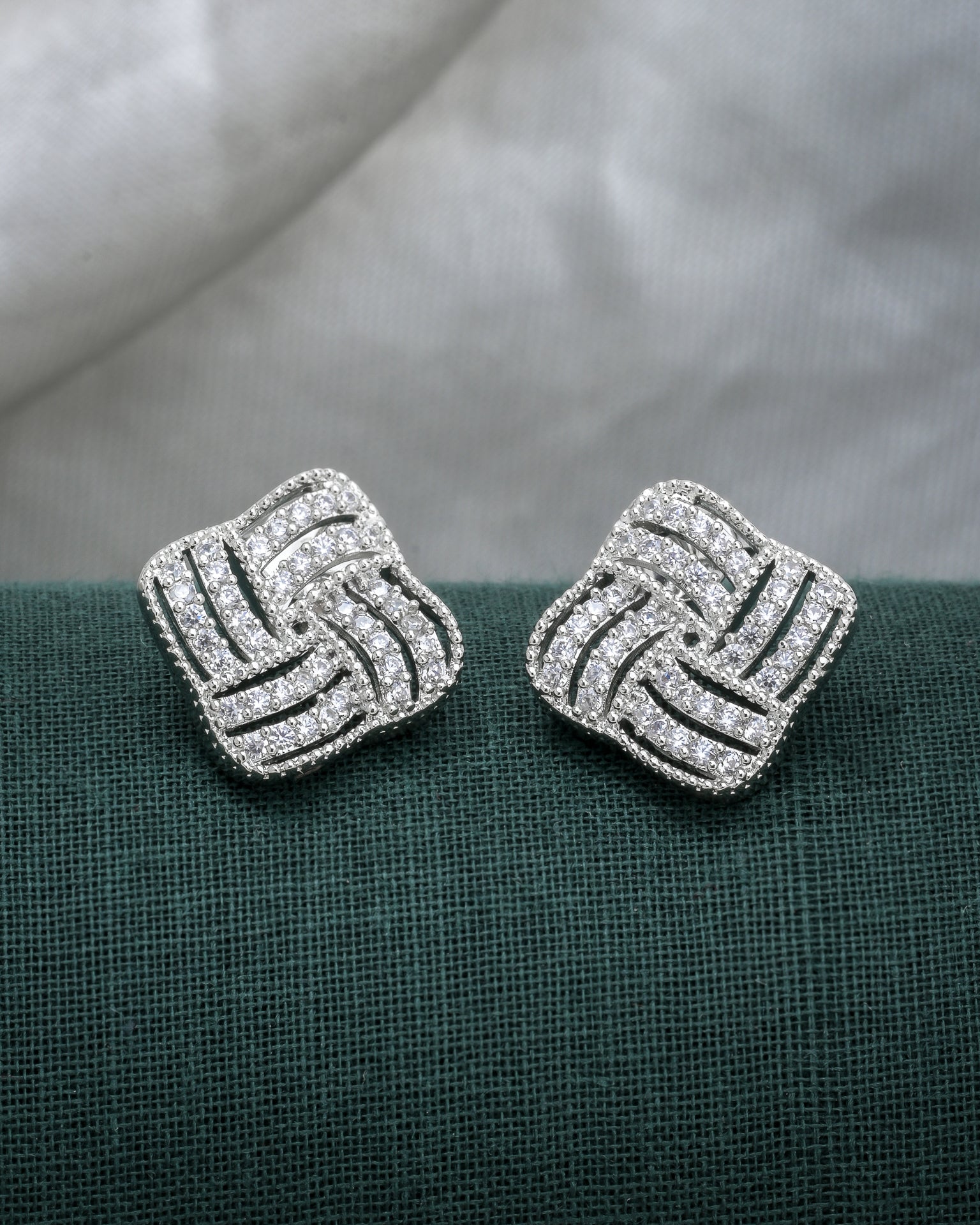 Ribbon Twirl Silver Studs